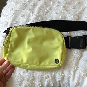 Lightly used neon green lululemon everywhere belt bag